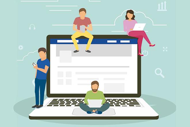 personas al rededor de un ordenador portatil