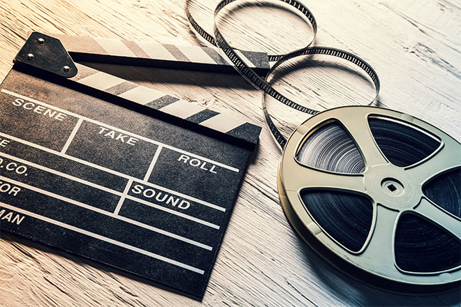 Bobina de película y claqueta