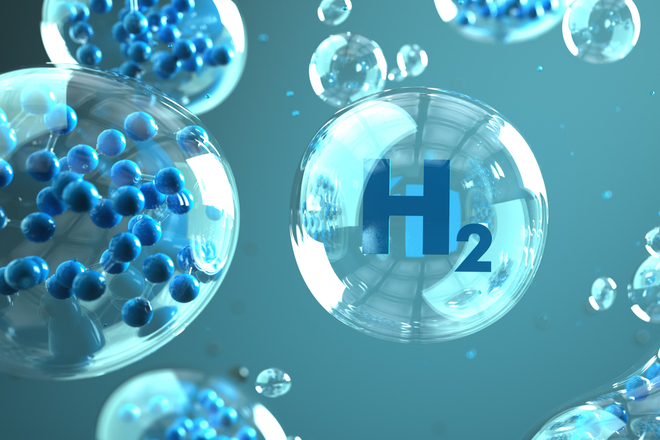 simulación de gotas con el símbolo químico del hidrógeno H2 en el centro